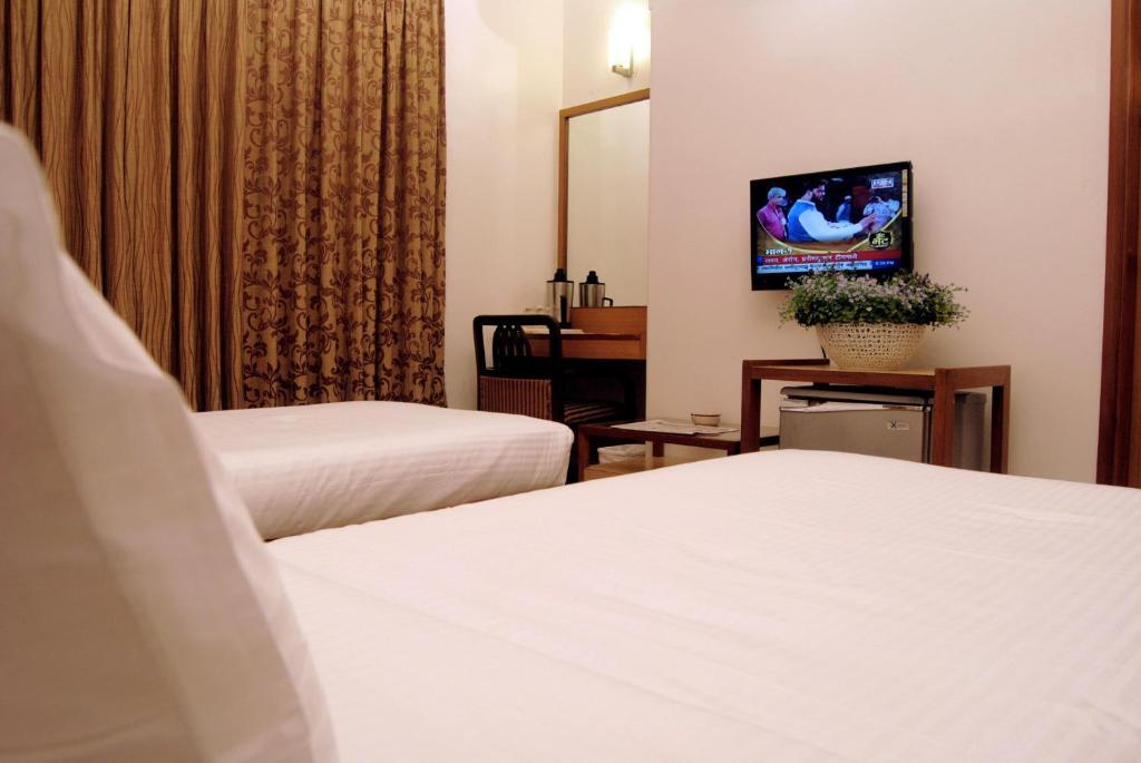 The Ambience Hotel Pune Habitación foto